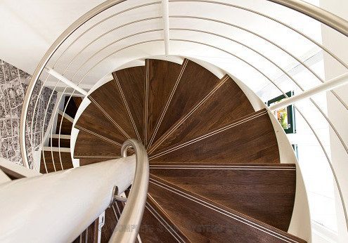 walnut steps on a spiral staircase