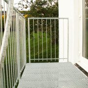 non slip platform with handrail and spindles outside