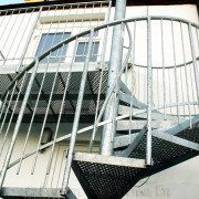 external galvanised fire escape to white building
