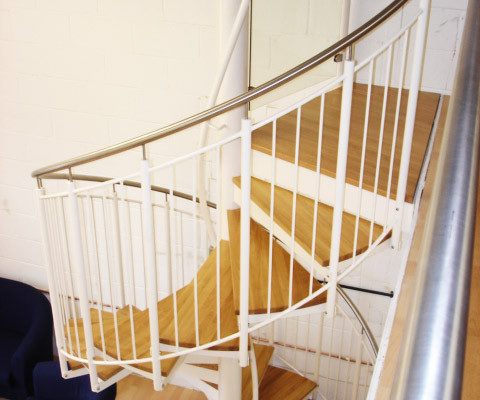 stainless steel handrail along a mezzanine level