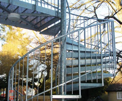 outdoor spiral stair in a forest