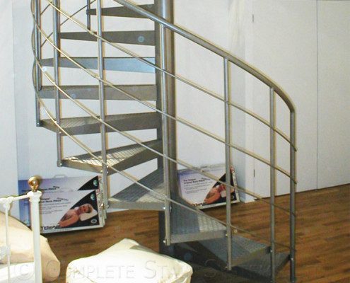 dark grey steel spiral stair with horizontal bars