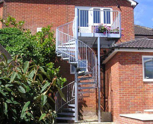 red brick house with spiral staircase