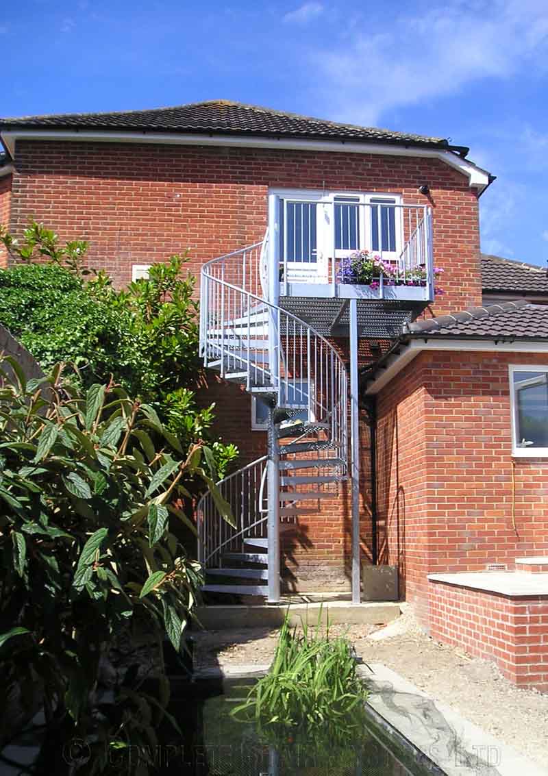 Bespoke Spiral Staircase Southampton - External Spiral 2 red brick house with spiral staircase