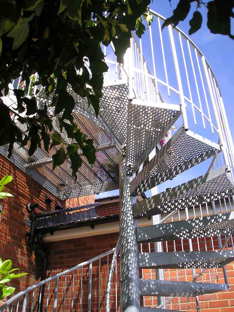 perforated steel steps on a spiral staircase outside