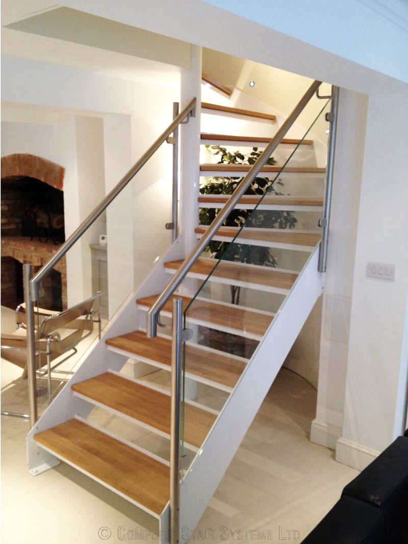 glass panels to spiral staircase in white steel