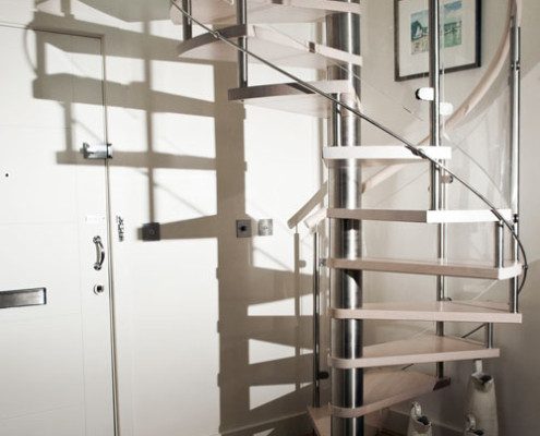 spiral staircase in a house with large shadow