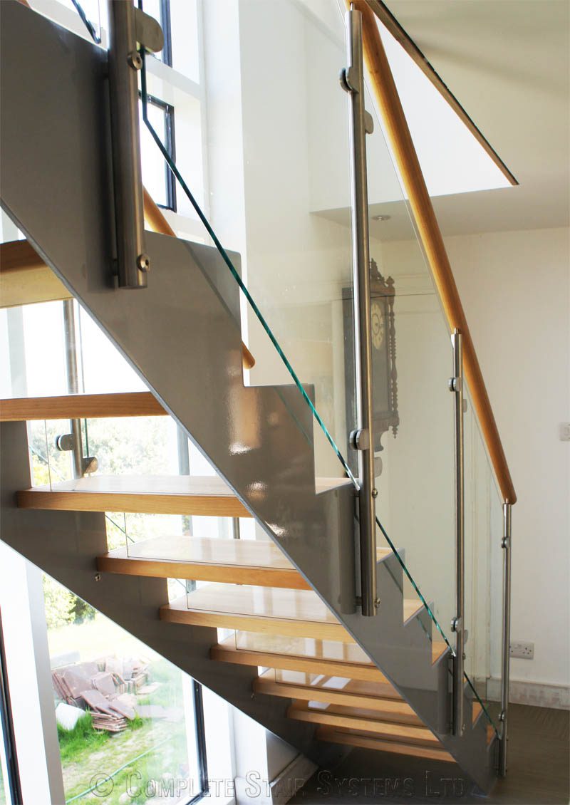 Bespoke Staircase Haslemere - Model 500 grey steel stringers with glass panels