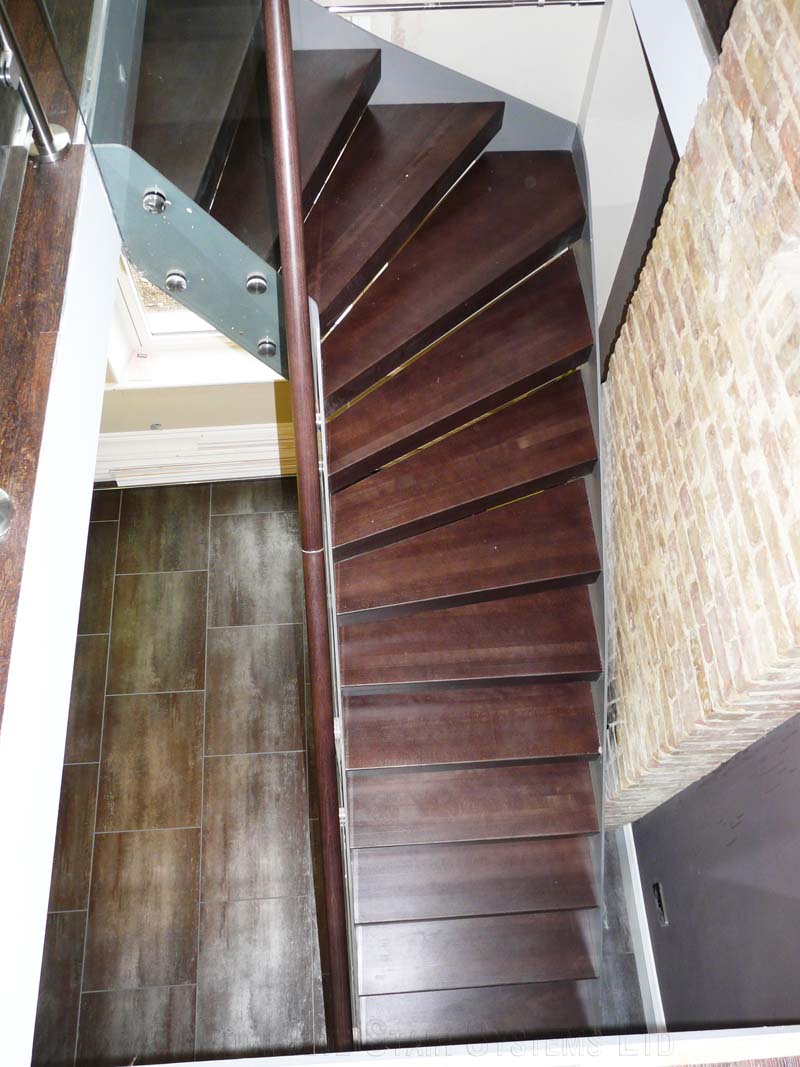 Bespoke Staircase Kent - Model 500 red wood stair in a quarter turn shape