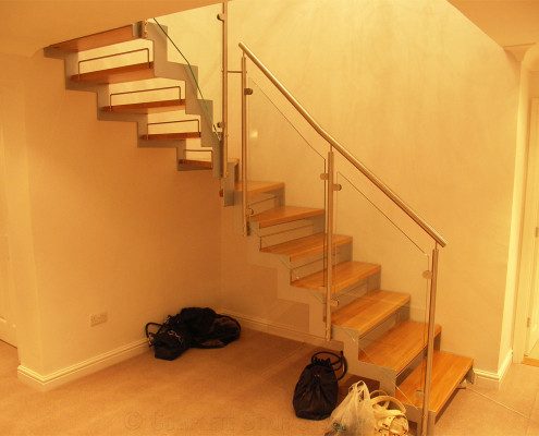 zig zag steel stringer staircase with bags underneath
