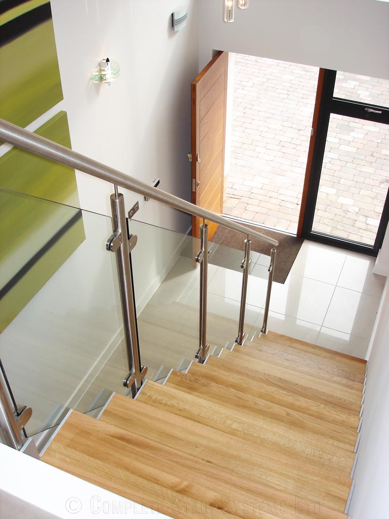 Bespoke Staircase Poole - Model 500 2 looking down into a hallway with a modern oak staircase