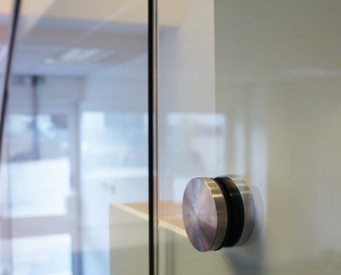 Bespoke Staircase Romsey - Model 500 stainless steel glass clamps with glass panel