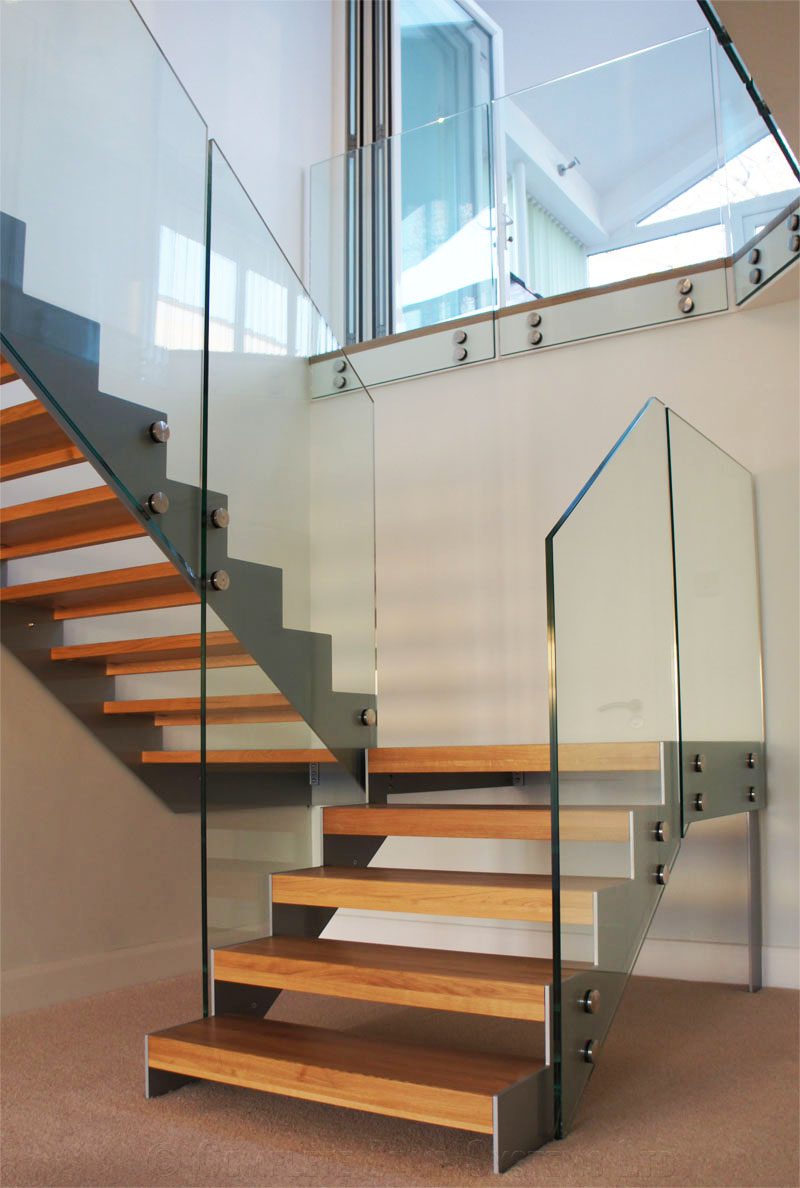 half turn stair with large platform with grey stringers in steel