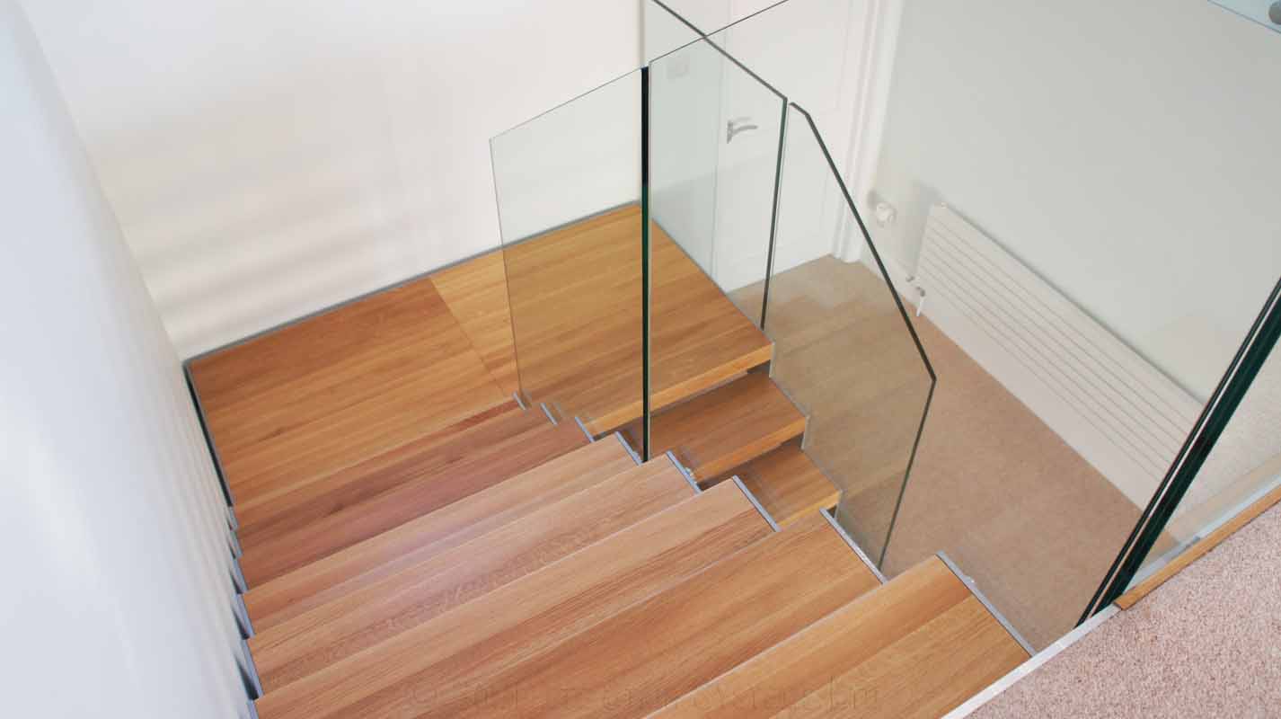 Bespoke Staircase Southampton - Model 500 oak steps on a half turn staircase with glass staircase