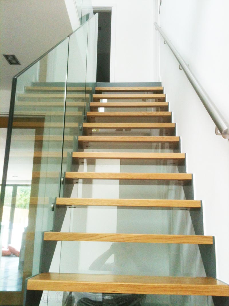 straight flight staircase with glass risers