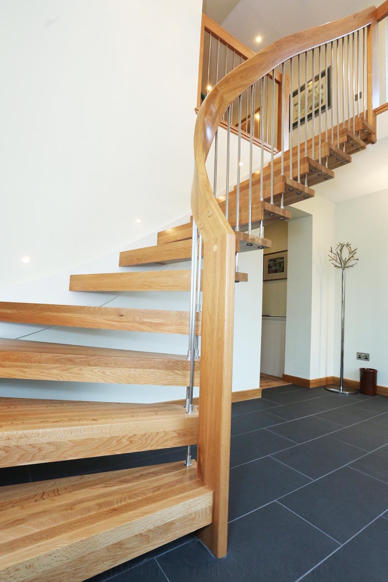 Bespoke Timber Staircase - Aberdeen curved handrail on a staircase with open risers