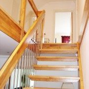 open riser floating style oak staircase with glass landing balustrade