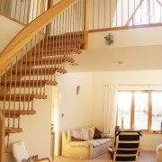 floating style stair leading up to a mezzanine floor