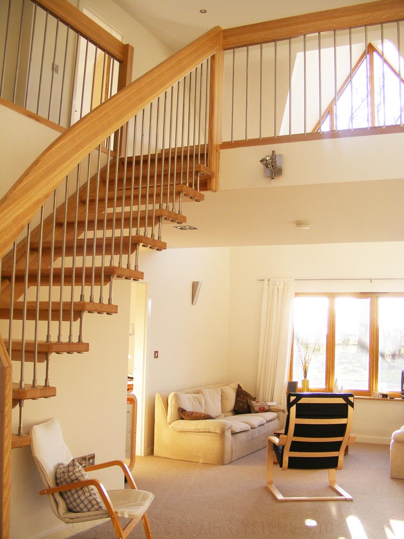 Bespoke Timber Staircase Coventry floating style stair leading up to a mezzanine floor