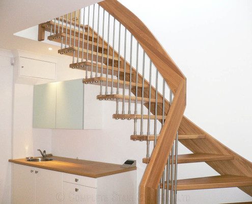 staircase with stainless steel spindles and open risers