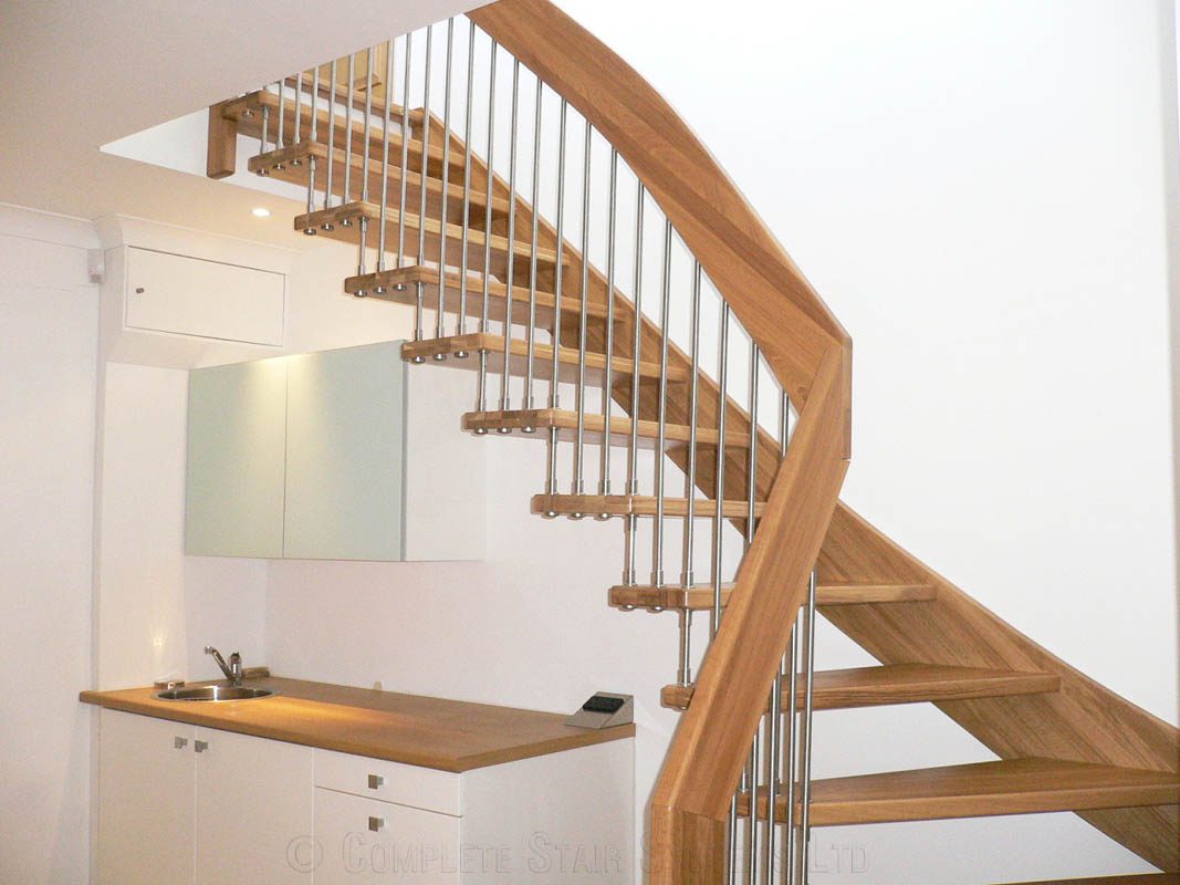 staircase with stainless steel spindles and open risers