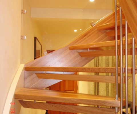 glass infill panels of rear of an open riser staircase
