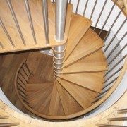 Spiral Staircase Balham 1 oak tread spiral stair with stainless spindles in a circular opening