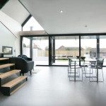 timber and glass stair in a kitchen dining area