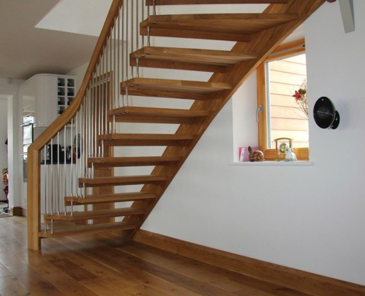 timber floor below floating timber staircase
