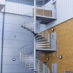 large double flight spiral fires escape to rear of building