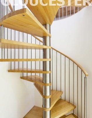 spiral stair with stainless spindles and oak treads