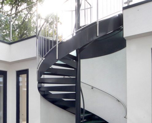 black external spiral staircase with stainless steel spindles and handrail