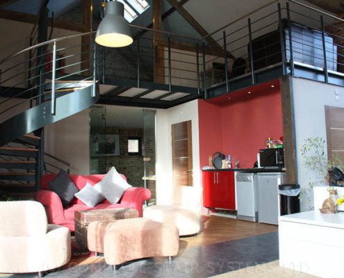 large walkway above a offer with spiral stair to one side