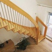 patio doors and timber floor with timber staircase in floating style
