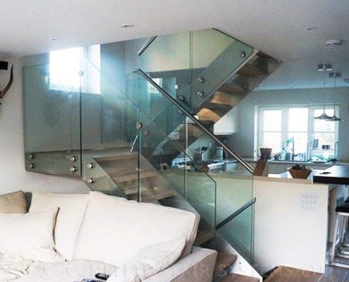 Modern-Staircase-London-1 glass balustrade on a steel staircase in living and kitchen area in a house