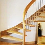 quarter turn staircase with curved handrail and open risers