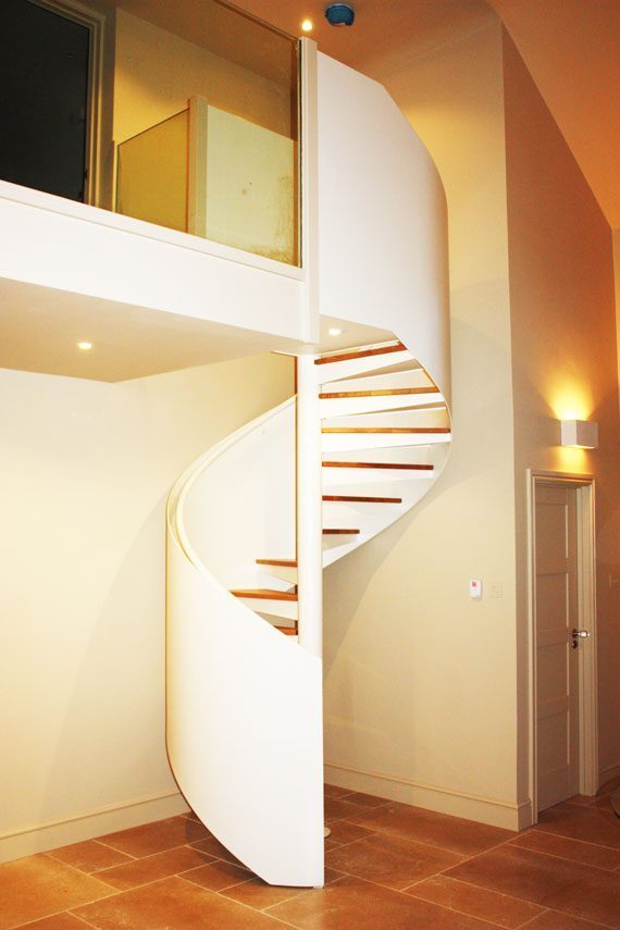 steel walled spiral staircase in white