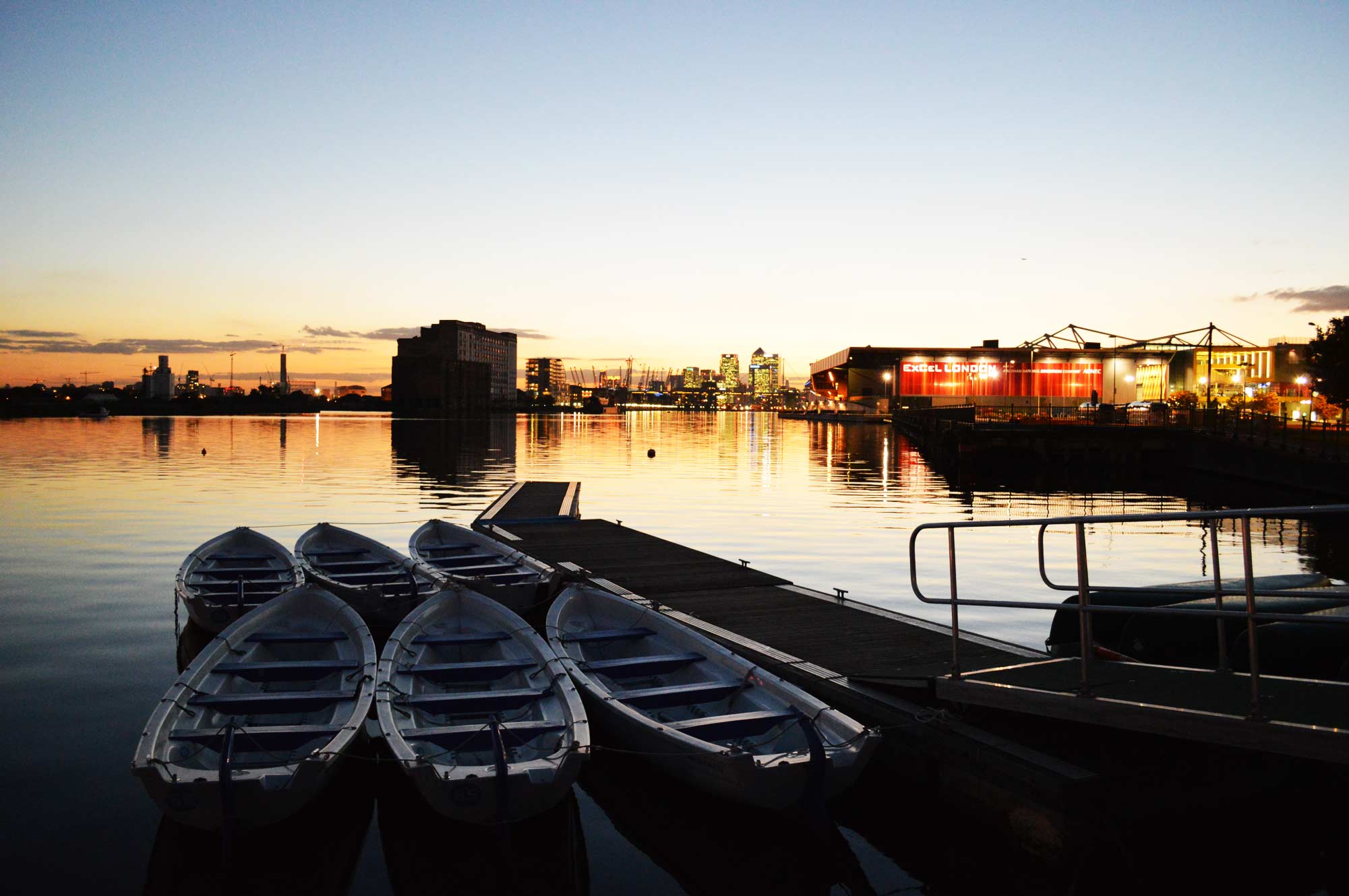 thames river at dusk with excel centre