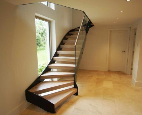 Bespoke-Staircase-Alresford-3 open riser staircase in front of window in hallway
