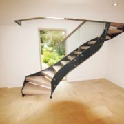 black steel staircase with timber steps in front of a window