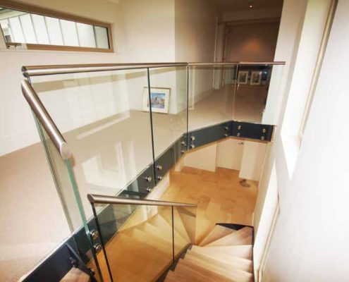 Bespoke-Staircase-Alresford-8 landing area and staircase with black steel fascia