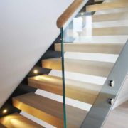 glass panel to side of black steel stair