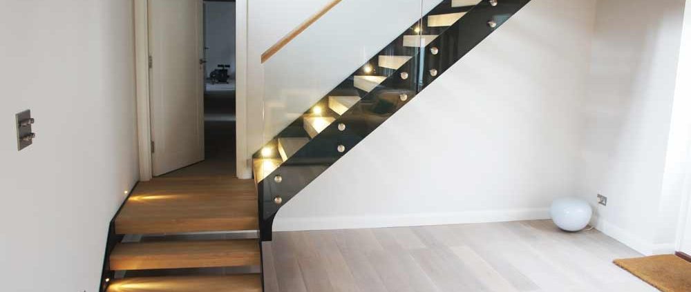 Bespoke-Staircase-Godalming-7 quarter turn oak stair with frameless glass balustrade