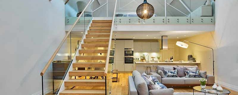 Bespoke-Staircase-Midhurst-5 open riser white and oak stair in an open living rood