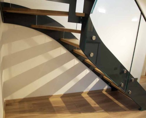 Modern-Staircase-Bromley-2 black steel stringer and glass panels to side of stair