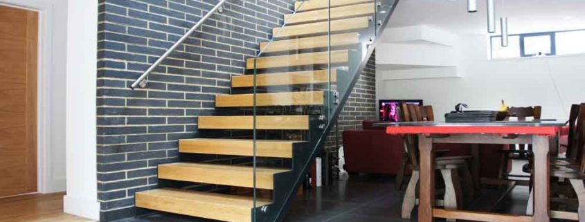 Modern-Staircase-Stamford-2 dining room with dark grey floor and straight flight stair with open risers