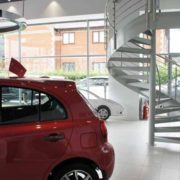 white spiral stair in a car showroom