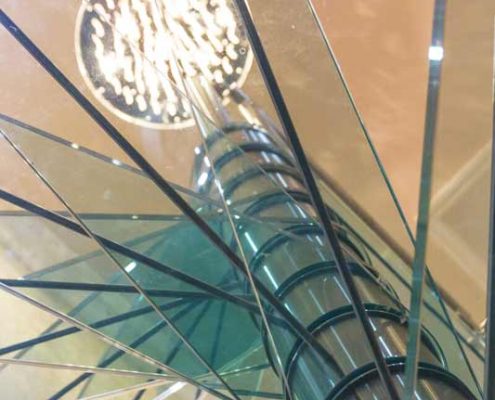 spiral stair with stainless steel centre column and glass steps