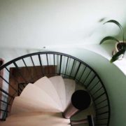spiral staircase with wooden steps and steel spindles and handrail