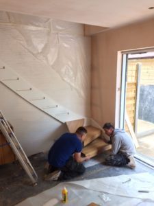 fitters installing a floating staircase